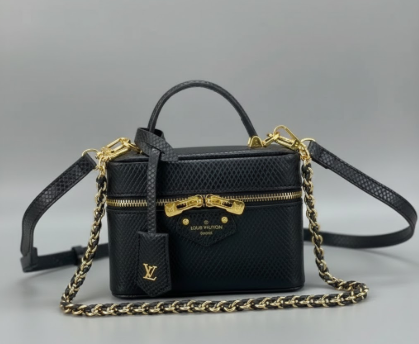 Louis Vuitton vanity bag in black with gold hardware Louis Vuitton vanity bag in black with gold hardware