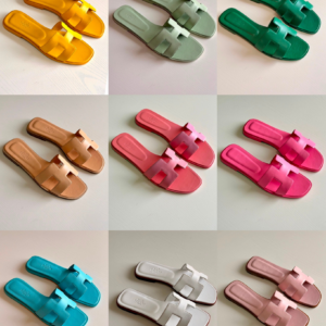 Authentic Pastel Hermès Oran smooth leather sandals featuring the iconic H cutout strap in a soft, delicate finish.